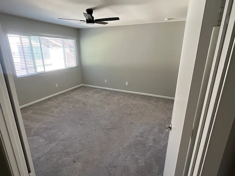 2nd master bedroom with remote powered ceiling fan and with private full bath.