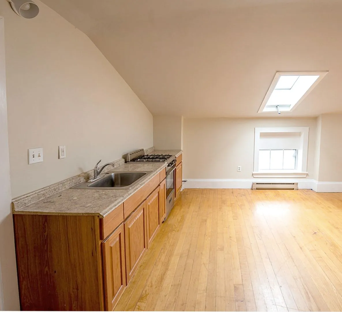 Top-Floor 2-Bedroom Oasis | Heat, Hot Water, Parking & Laundry in the West End! — Photo 3