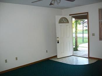 Come in under the covered porch into the living roombr