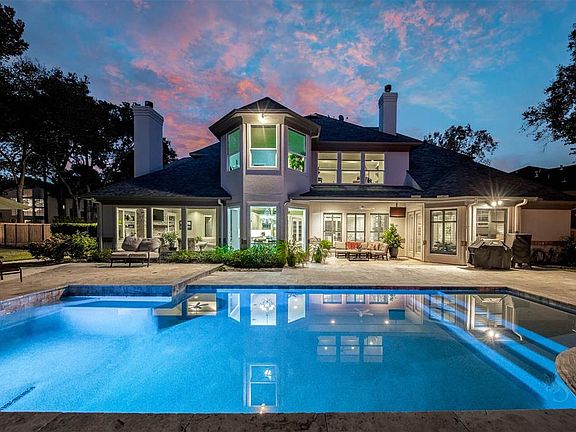 Situated on over a half acre wooded lot the home boasts stunning views from every room in the house. There are just 10 custom homes in this absolute gem of a neighborhood. 4210 Canary is 5680 square feet of beautiful, move in ready living space.
