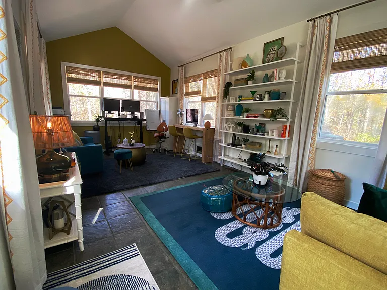Upstairs work loft with 2 sleeper couches. Work while looking out on the trees. Fiber internet at home.