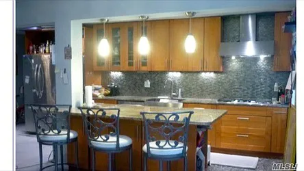 Sold by East Coast Realtors Inc.