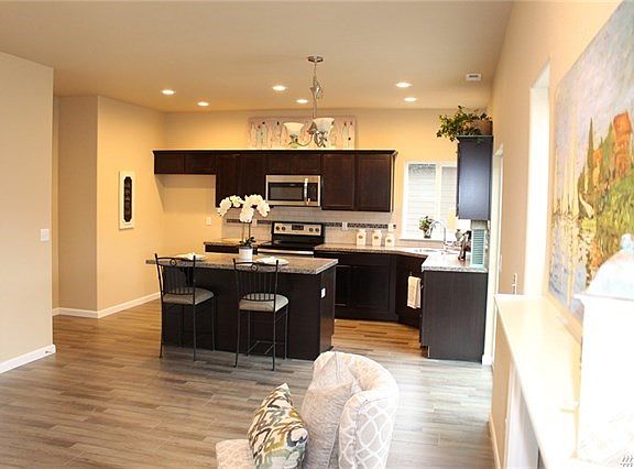 Looking toward the kitchen and island.