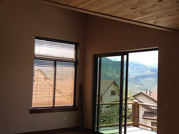 Sliding glass door opening to spacious front deck