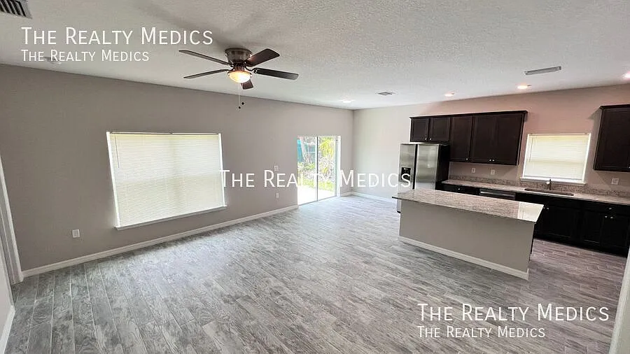 Spacious 3-Bedroom Home with Garage & Patio Palm Bay, FL — Photo 4