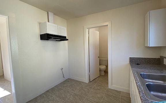 kitchen behind living room