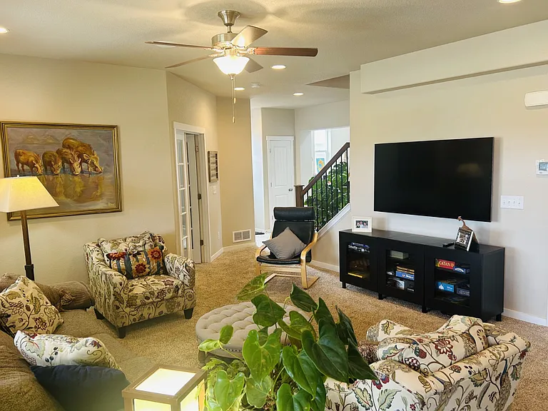 Your living room is open and light. Hook up for TV is ready for you!