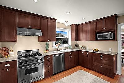 Kitchen. The stove has been replaced with a new gas stove since this photo was taken. A brand new Miele dishwasher was installed in June 2021.