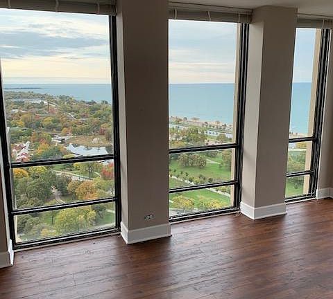Living Room with North views of Lincoln Park & Lake Michigan.