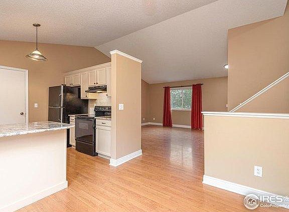 Open floor plan kitchen, dining, living room