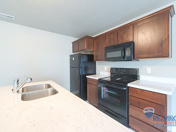 5th image of 14446 S Sunningdale Ct