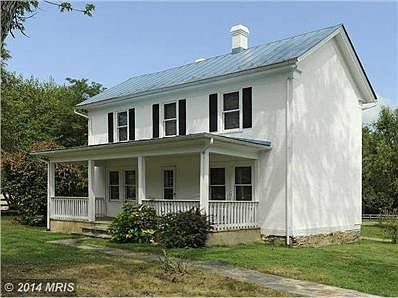 Stone walkway from drive to front door.