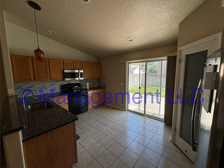 9659 W Rustica Dr — Photo 9