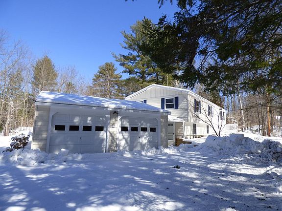 Front Exterior, two car semi-attached garage