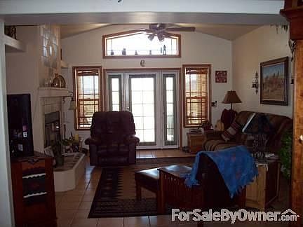 Living area
						:
						Fireplace tiled by a Navajo Indian. All tile work in home by same Navajo.