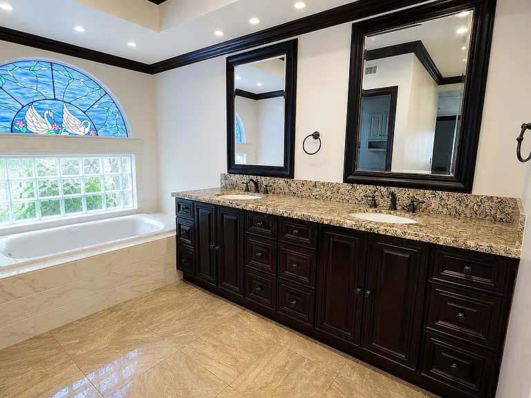 Master bathroom with a tub and a separate shower