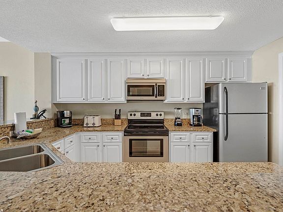 3rd image of 527 Beach Club Trl #C308