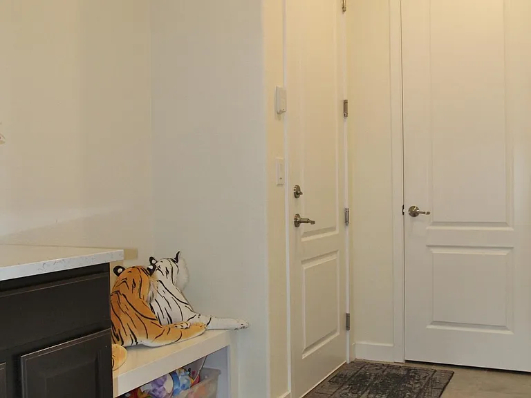 Huge mudroom (10' by 6'7") at garage entrance