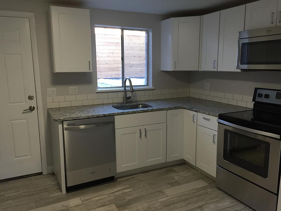 Kitchen is fully remodeled with stainless steel appliances.