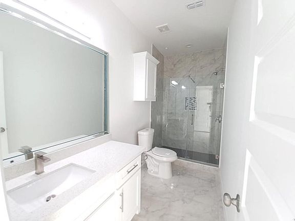 5th image of 1404 S Xanthia St APT 3