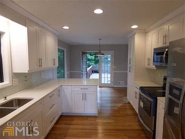 Kitchen with new cabinets and quartz countertops