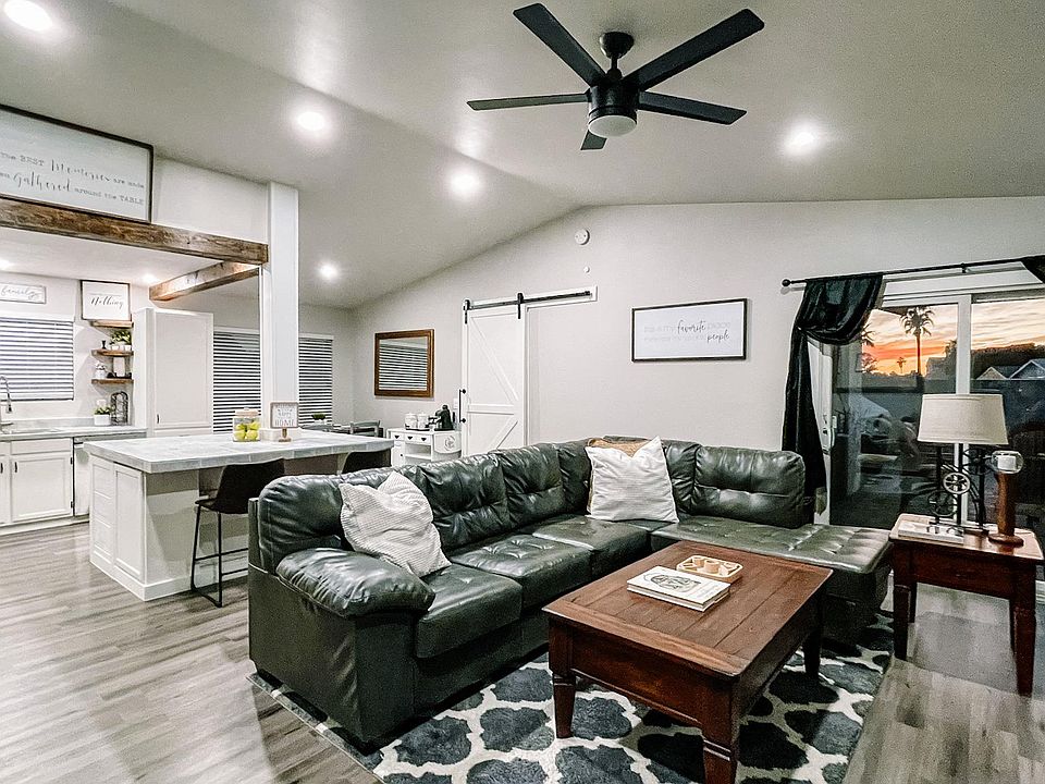 Living Room View with open kitchen concept. Views of backyard and pool