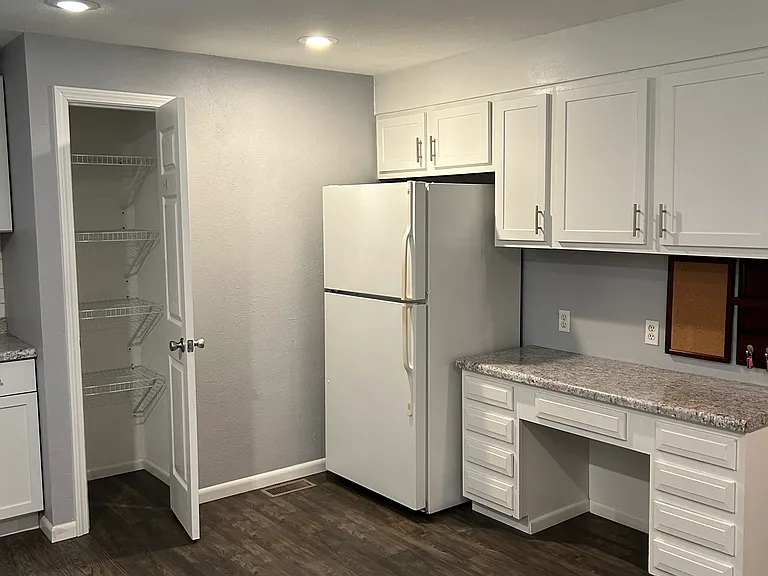 Spacious eat in kitchen with pantry.
