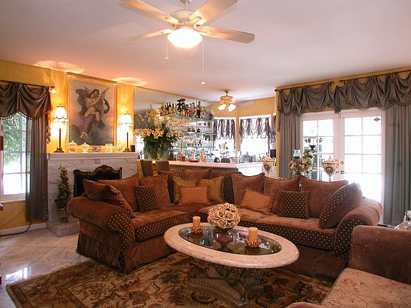 Family room with fireplace & wet bar