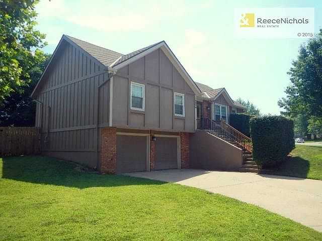 Well maintained raised ranch was a former model. Sits on large t