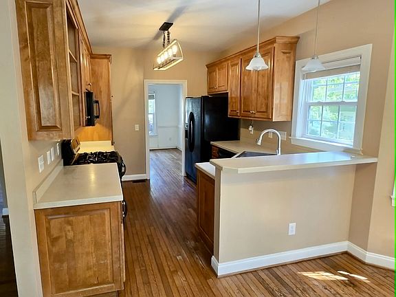 Eat in kitchen, kitchen and formal dining room.