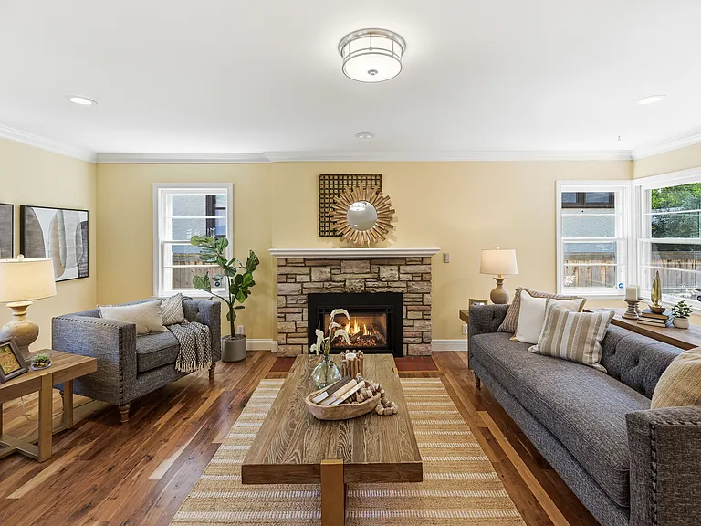 View of living area from the dining area and open kitchen