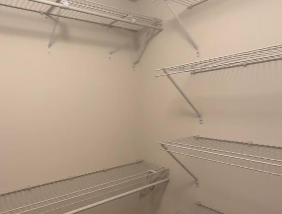 Two walk-in master bedroom closets