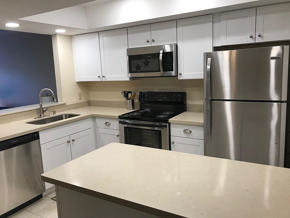 New kitchen with new appliances, quartz counters, dishwasher. Large laundry room and pantry off of the kitchen.