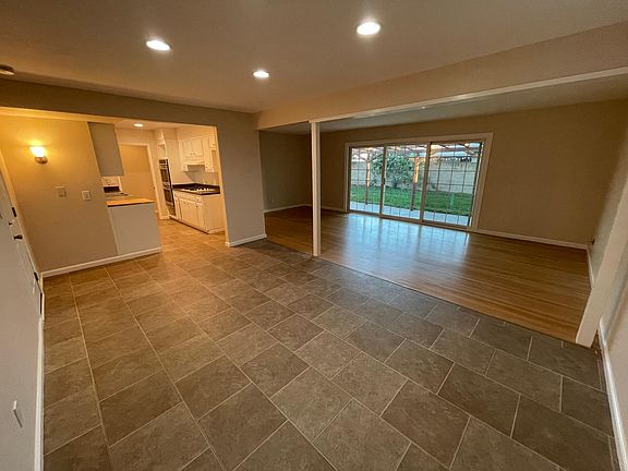 Open dining room connected to living room.