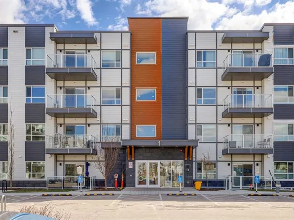360 Harvest Hills Way W #106, Calgary, AB T3K 2S1