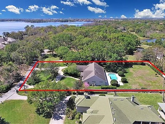 Prime one acre lot with lake views in the front