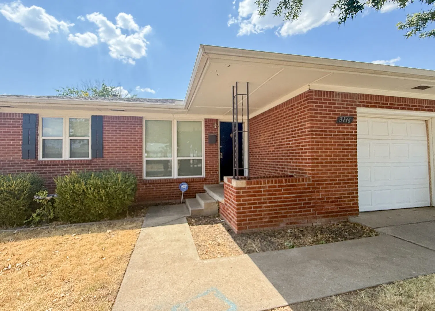 3116 NW 65th St | Hardwood Floors + Sunroom | NW OKC — Photo 4
