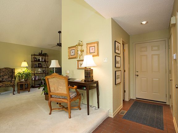 Entry has new brick tile floor