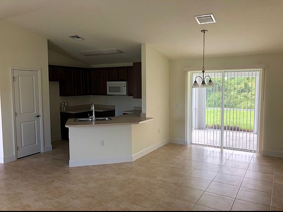 18 Tile Throughout except for Carpeted Bedrooms