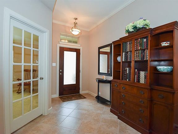 Grand foyer.  Double wide entryway with real wood front door.
