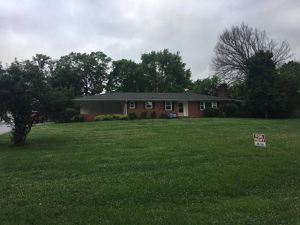 Front view showing large lot, Home sits back from road.