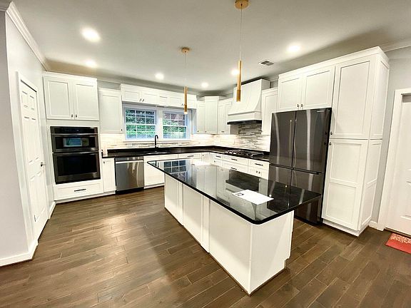 2nd image of 7102 Woodley Ln