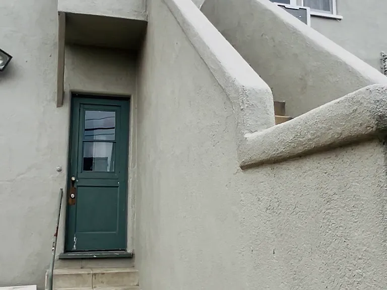 Staircase to backdoor
