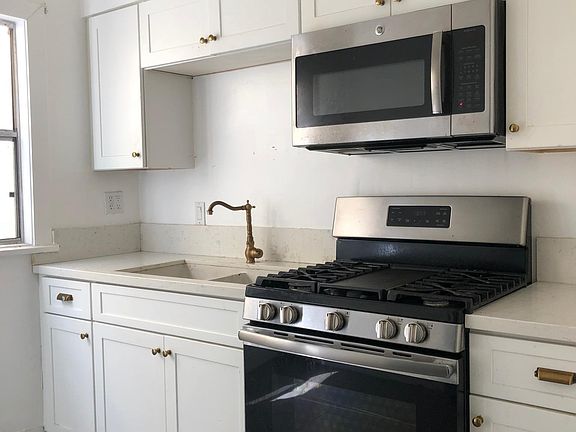 Updated kitchen with stainless steel appliances