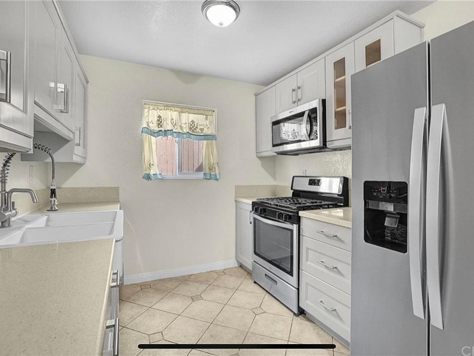 1st image of 12828 Ramona Blvd Unit 44