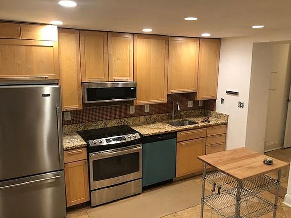 Kitchen with new stainless steel DW and new microwave