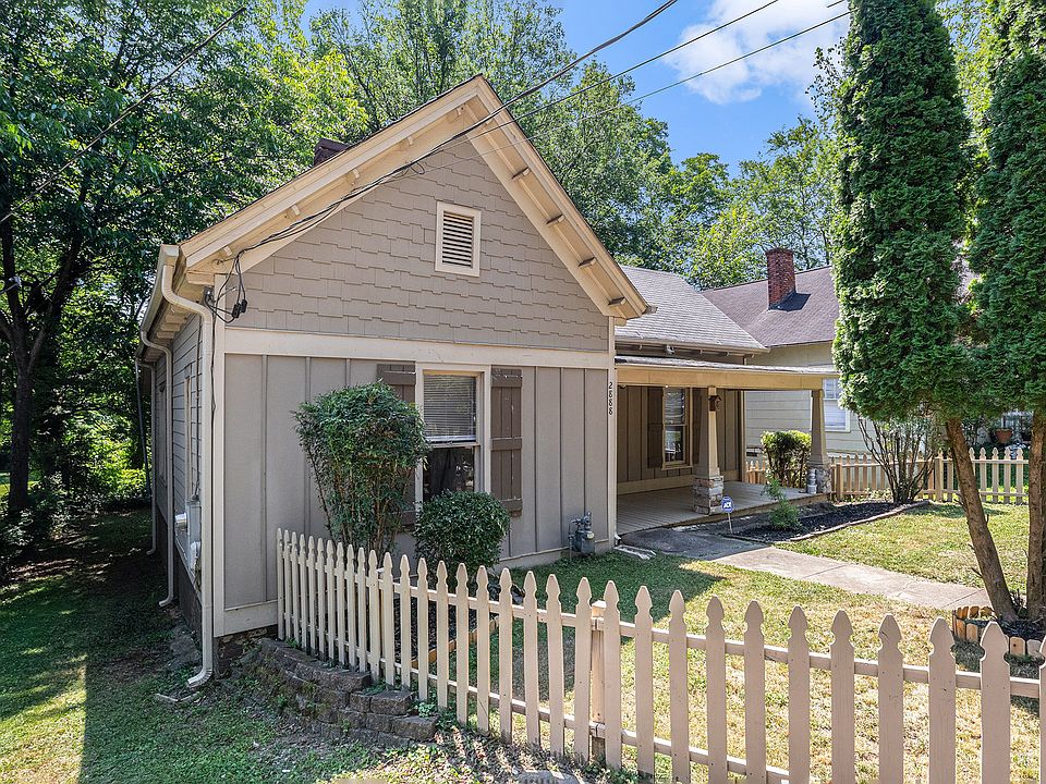 Front exterior with picket fence