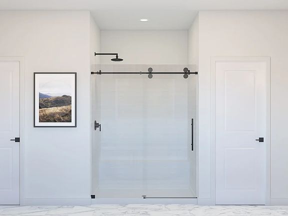 Primary bath with glass shower enclosure