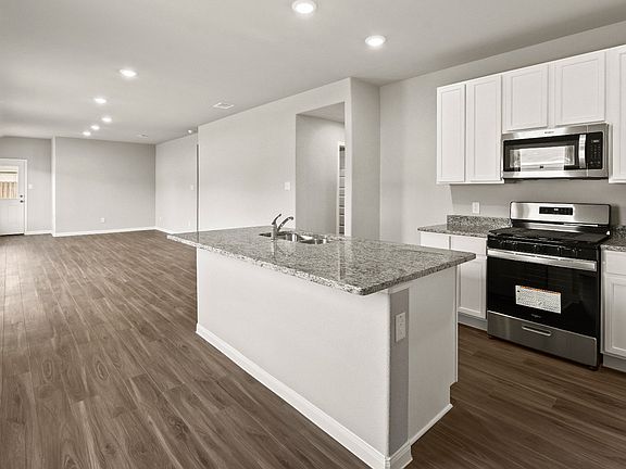 Dining Area to Kitchen and Family Room