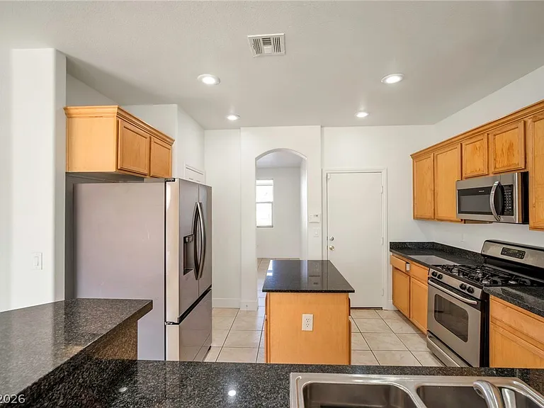 9711 Spinnaker Creek Ave — Photo 31